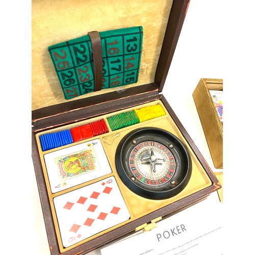 165 - Cased poker set and a cased games set