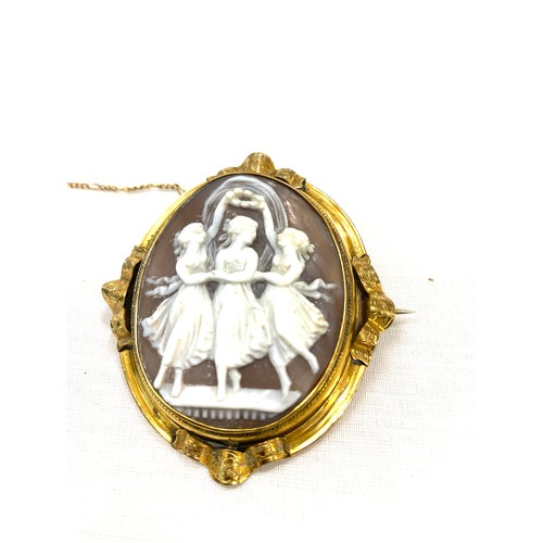 512 - Large pinchbeck swivel cameo of three graces with safety chain 7 cm by 5.5 cm