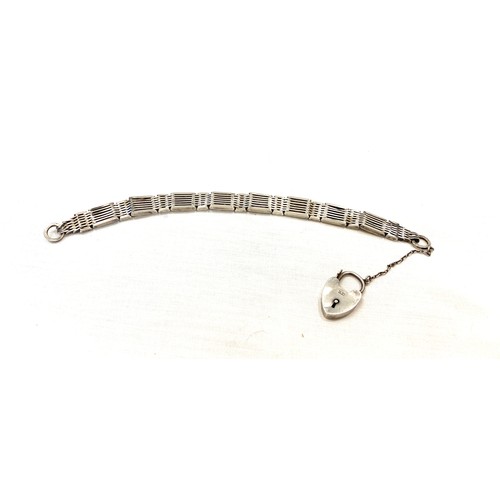 516 - Silver bracelet with yellow metal flowers attached including safety chain