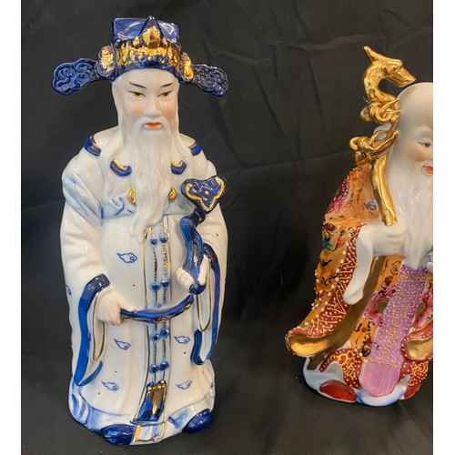 48 - 2 Chinese figures, approximate height 11 inches