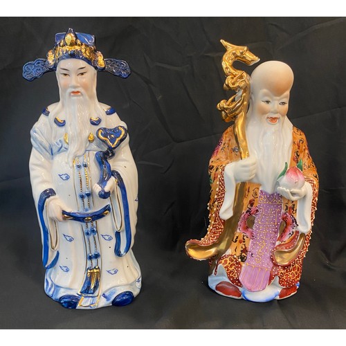 48 - 2 Chinese figures, approximate height 11 inches