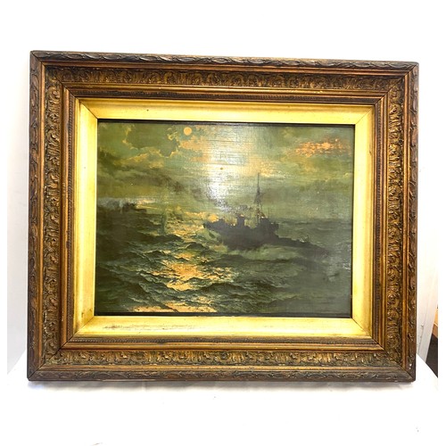 32 - Carved framed picture of a battle ship measures approx 20 inches tall 24 inches wide