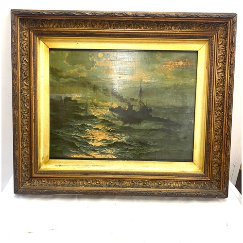 32 - Carved framed picture of a battle ship measures approx 20 inches tall 24 inches wide