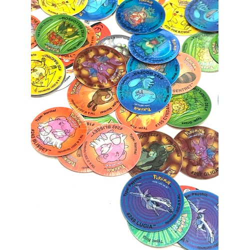 141 - Selection of vintage and later Pokemon Tazos