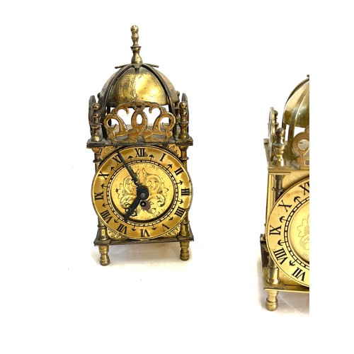 46 - Three vintage brass roman numerical clocks. Measures approx 7.5 inches high- Untested