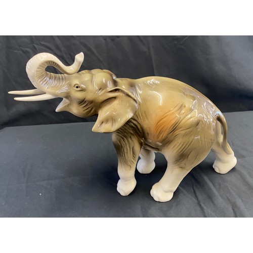 7 - Vintage Royal Dux Elephant figure, measures approx 8.5 inches tall 11 inches wide, damage to tusk