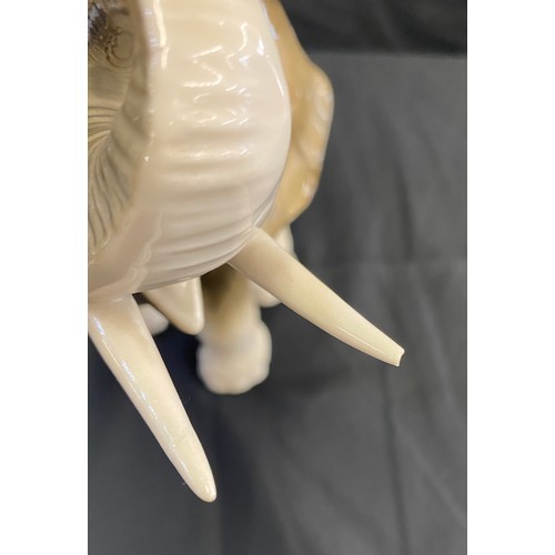 7 - Vintage Royal Dux Elephant figure, measures approx 8.5 inches tall 11 inches wide, damage to tusk