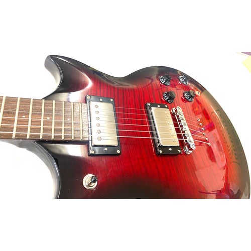 63 - Cased electric guitar, in as new condition in case