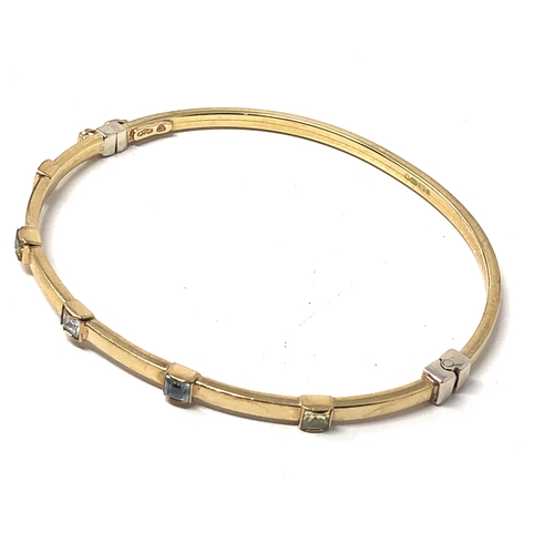 32 - 9ct gold gem set bangle weight 4.8g