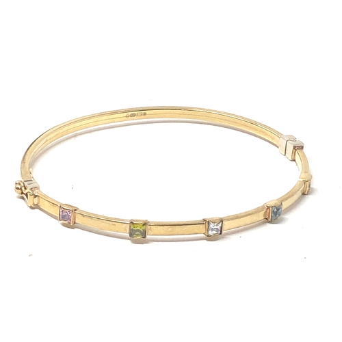 32 - 9ct gold gem set bangle weight 4.8g