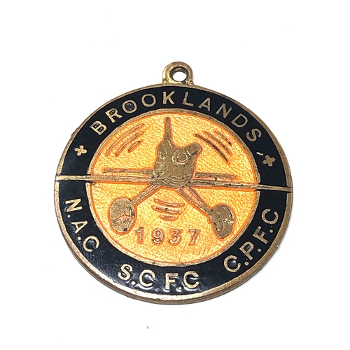 414 - Rare 1937 Brooklands Flying Club Membership Badge
A rare gilt and enamel badge, the reverse with mak... 