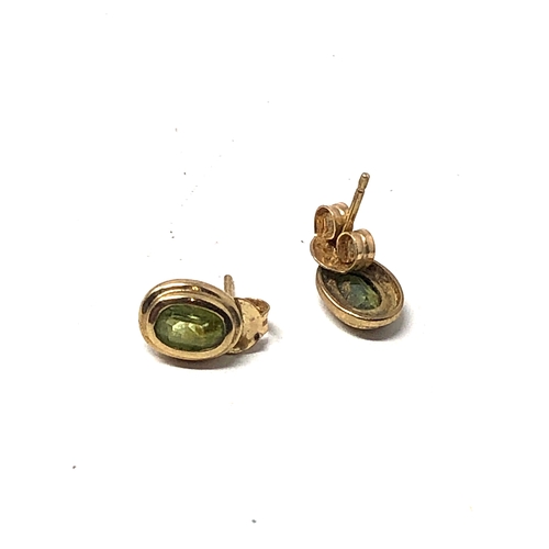 37 - 9ct gold peridot earrings weight 1.4g