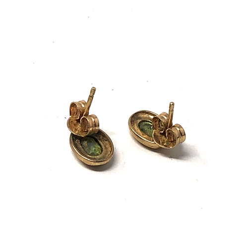 37 - 9ct gold peridot earrings weight 1.4g