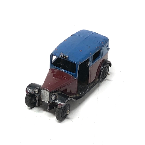 396 - Early Dinky toys taxi