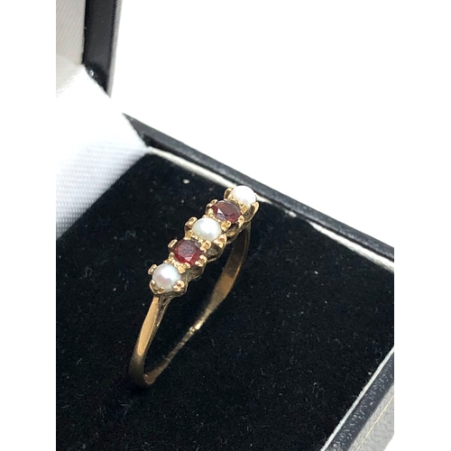 47 - 9ct gold garnet & pearl ring weight 1.9g