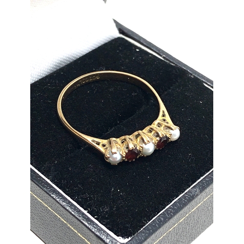 47 - 9ct gold garnet & pearl ring weight 1.9g