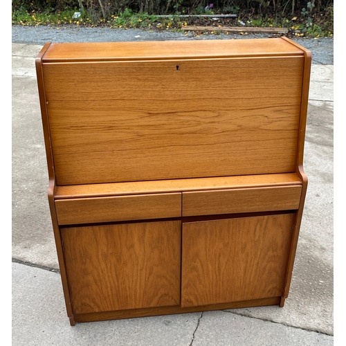 447 - Teak remploy bureau measures approx 42 inches tall 36 inches wide 16 inches depth