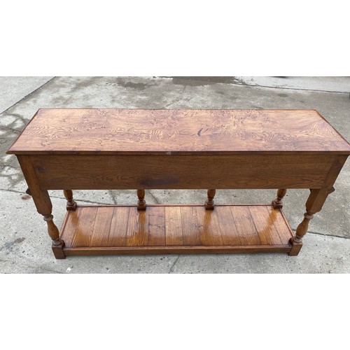 455 - Titchmarsh and Goodwin 3 drawer Burr oak sideboard with keys measures approximately 33.5 inches tall... 