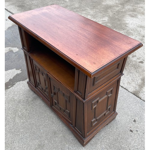 448 - Mahogany 2 door TV cabinet measures approx 29 inches tall 32 inches long 17 inches wide