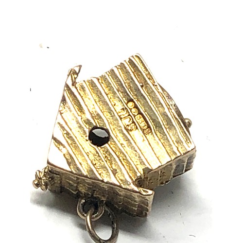 70 - 9ct gold vintage rotating couple in house charm (3.4g)