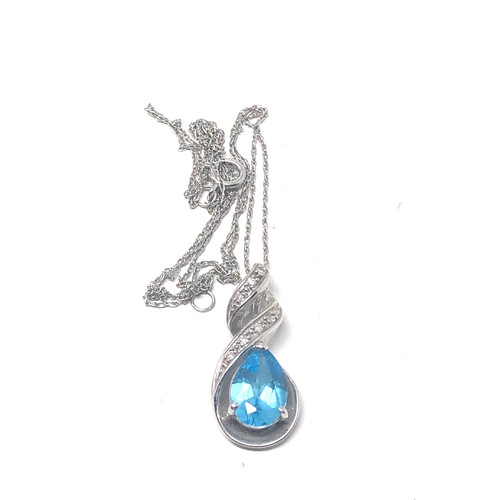 122 - 9ct white gold diamond & topaz pendant necklace (2.1g)