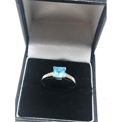 110 - 9ct white gold diamond & topaz dress ring (2g)