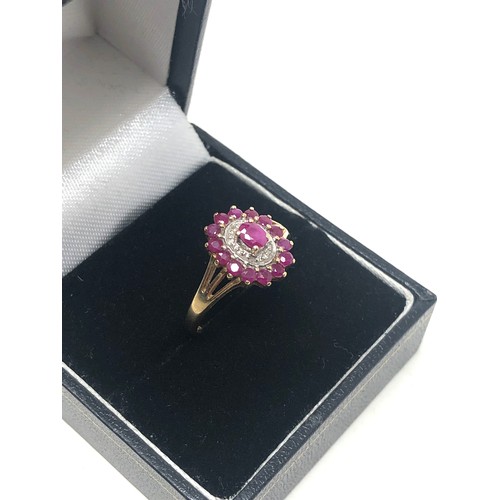 95 - 9ct gold vintage ruby & white gemstone halo ring (2g)