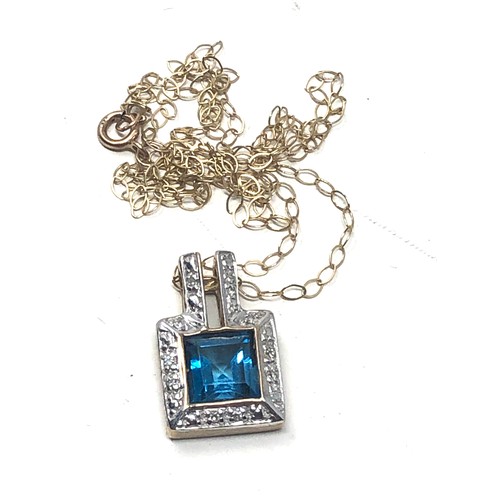 116 - 9ct gold vintage diamond & topaz halo pendant necklace (2.3g)