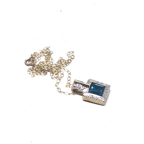 116 - 9ct gold vintage diamond & topaz halo pendant necklace (2.3g)