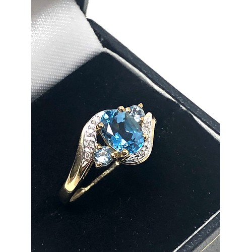 118 - 9ct gold vintage diamond & topaz twist setting dress ring (2.6g)