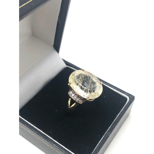 103 - 9ct gold rutilated quartz statement ring (4.1g)