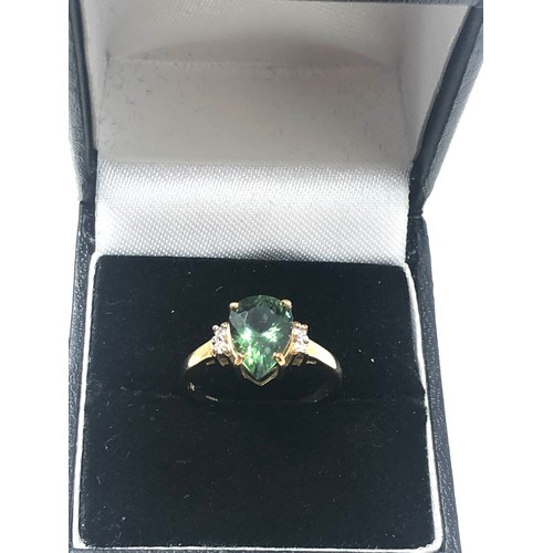 104 - 9ct gold diamond & tourmaline dress ring (2.2g)