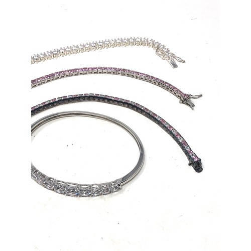 279 - 4 x .925 sterling silver bracelets including tennis, bangle, cz (67g)