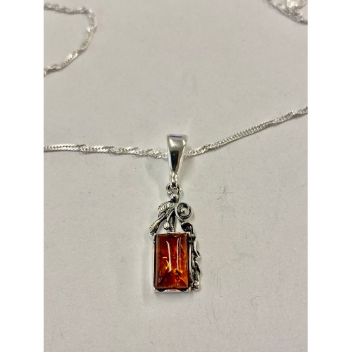 587 - Ladies hallmarked silver and amber pendant necklace