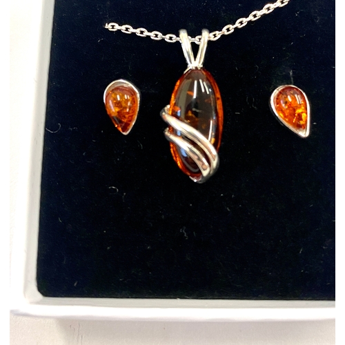 586 - Ladies hallmarked silver necklace and earring set with amber detailing