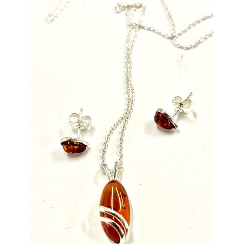 588 - Ladies hallmarked silver necklace and earring set with amber detailing