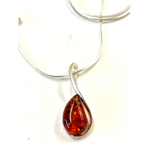 583 - Ladies hallmarked silver and amber pendant necklace