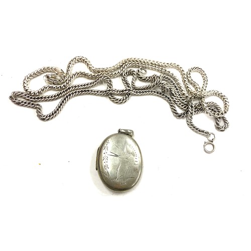 524 - Vintage silver chain with locket(not silver) and a heavy silver chain, total weight of chains 84 gra... 