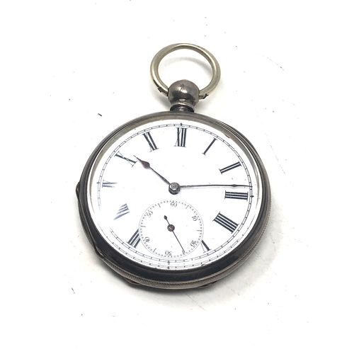 371 - silver open face pocket watch  the watch is ticking