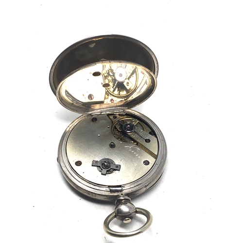 371 - silver open face pocket watch  the watch is ticking