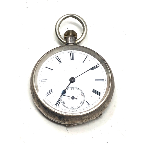 372 - silver open face pocket watch  the watch is ticking