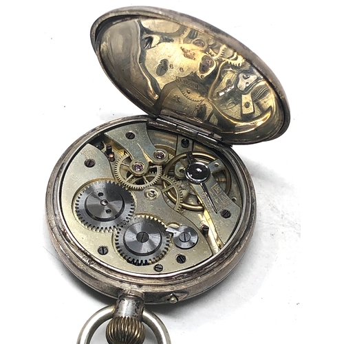 372 - silver open face pocket watch  the watch is ticking