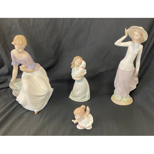 75 - Selection of Nao pottery figures includes spring reflections figure etc