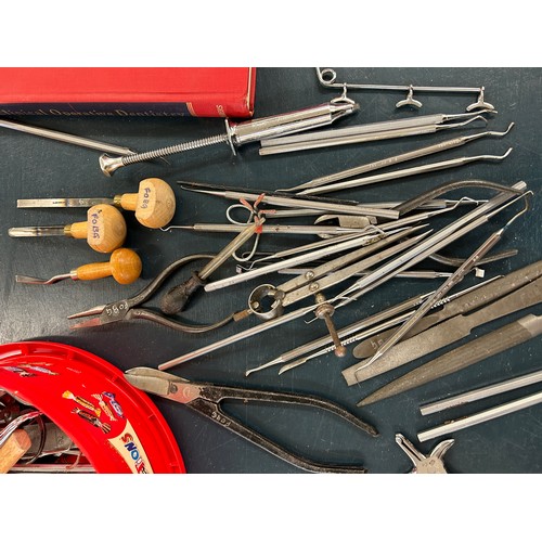 295 - Selection of dentist equipment includes clamps, book etc
