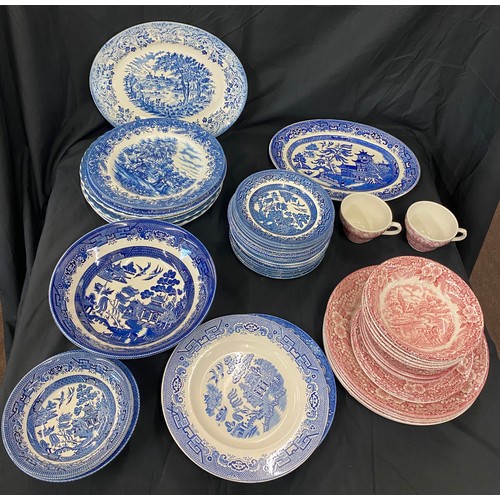 307 - Large selection of blue and white/ red and white vintage pottery