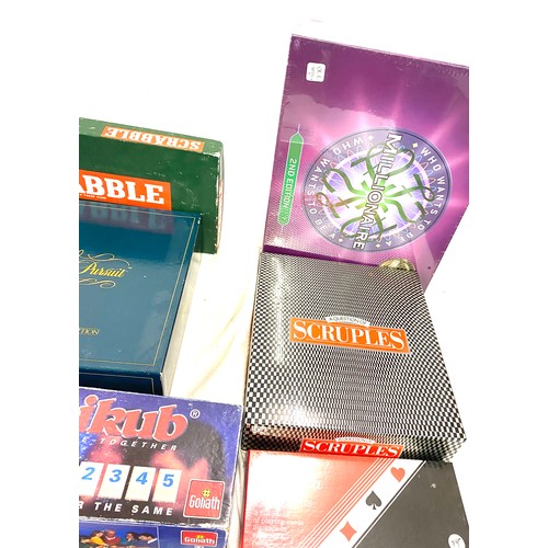 178 - Selection of vintage and later games includes Scrabble, Who wants to be a millionaire etc