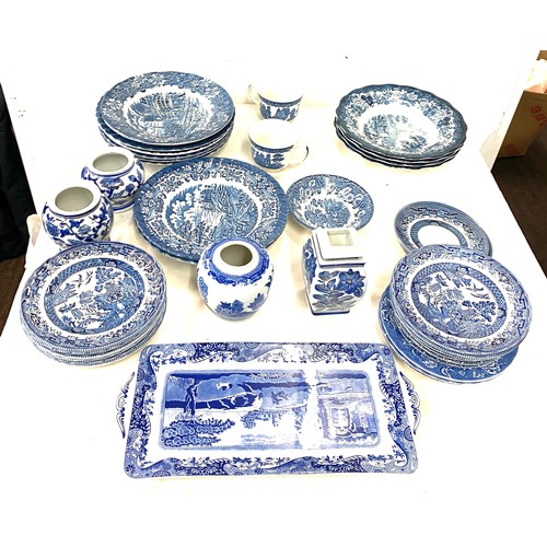 188 - Large selection of blue and white pottery includes lidded ginger jar, plates etc