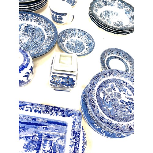 188 - Large selection of blue and white pottery includes lidded ginger jar, plates etc