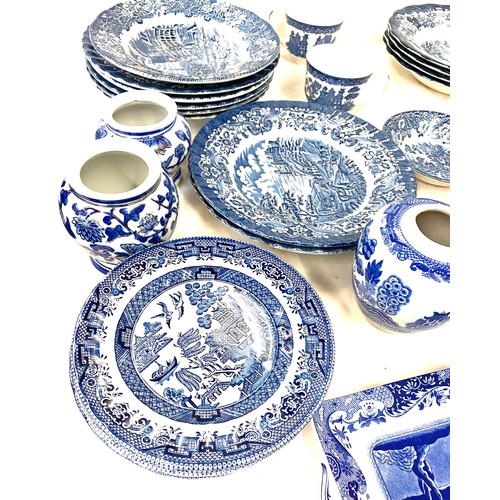 188 - Large selection of blue and white pottery includes lidded ginger jar, plates etc