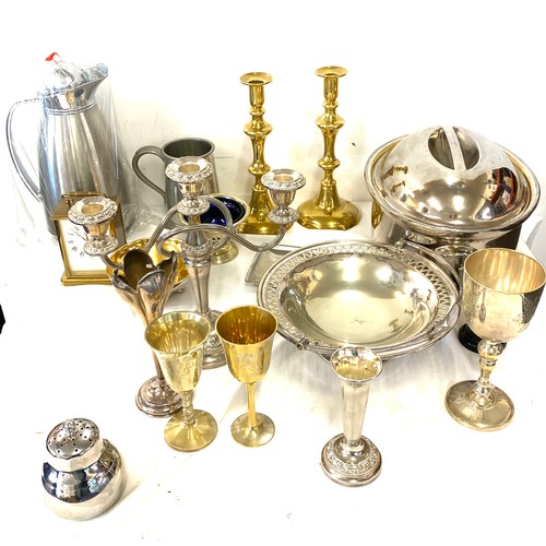 246 - Large selection of assorted metal ware includes Candle sticks, brass, silver plate etc